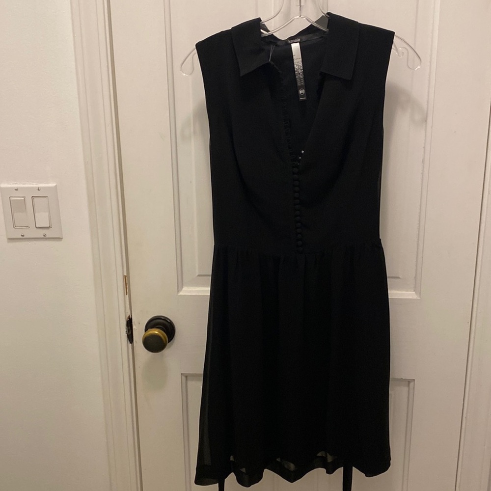 Kensie black dress with adorable button detail and tie at waist. Sz. Medium. NWT